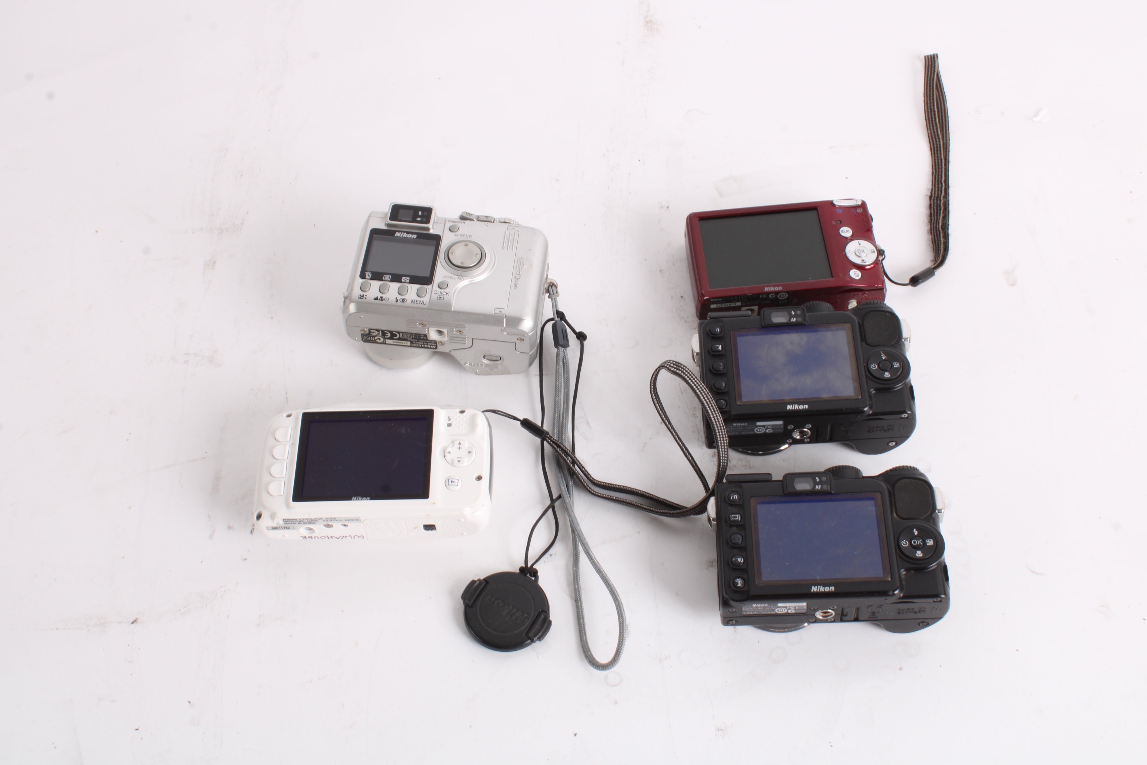 Nikon Coolpix S33, Coolpix L20, 2x Coolpix P5100, E4300 Cameras